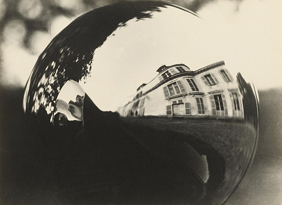 Man RayLOT 1155 | $ 6.500 - 9.100 / € 5.000 - 7.000Untitled (Reflections in a Car's Headlights), 1932 1940s, Vintage, Gelatin silver printAgfa paper, Mat. 21,3 x 29 cm