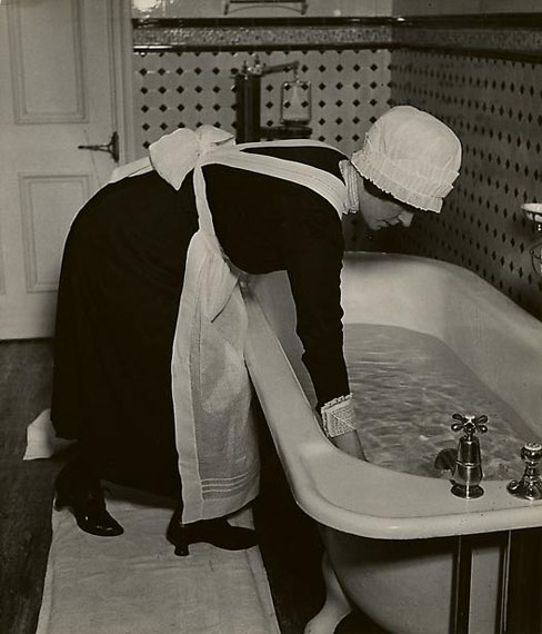Parlourmaid Preparing a Bath before Dinner, c. 1937&copy; Bill Brandt Archive Ltd.Courtesy Edwynn Houk Gallery