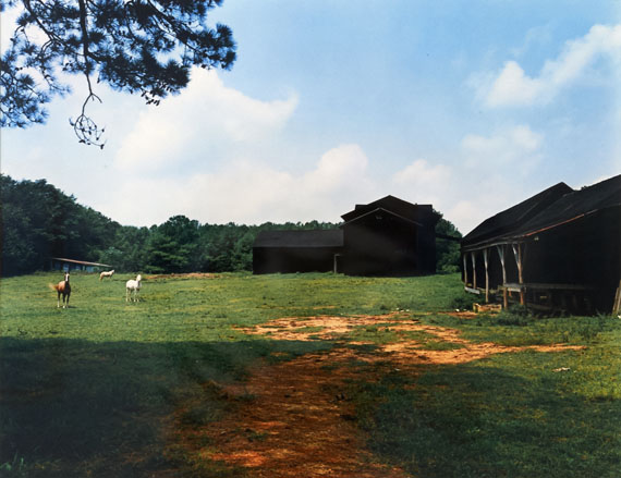 William Christenberry Horses and Black Buildings&mdash;Newbern, Alabama, 1978from the portfolio Ten Southern Images Vintage dye transfer print 50.8 x 60.96 cm / 20 x 24 in. &copy;William Christenberry, courtesy of Feroz Galerie