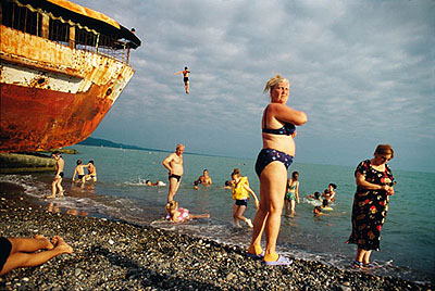 © Jonas Bendiksen/MagnumphotosAbkhazia. Sukhum. Locals & Russian tourists are drawn to the warm waters of the Black Sea, 2005from SatellitesPigment print40.5 x 60cm, edition of 20