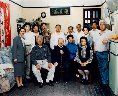 Lot 124Thomas StruthThe Ma Family, Shanghai, 1996C-type print, number 2 in an edition of 10, image 84 x 104cmEstimate £12,000-18,000