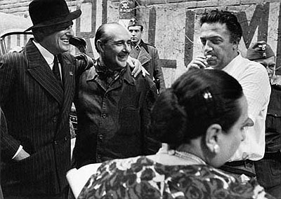 © William Klein: Vittorio De Sica, Roberto Rossellini and Federico Fellini on the set of 
