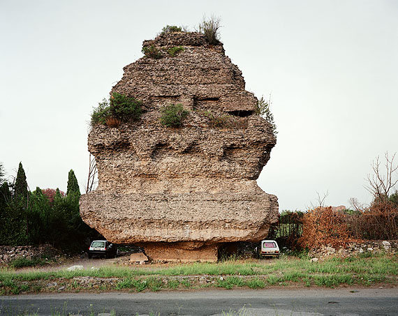 Joel SternfeldLovers parking beneath a pyramidal tomb of the second century A.D., Via Appia Antica, Rome, November 1990Digital c-print, ed. 756,5 x 71 cm; 22 1/4 x 28 inCourtesy Buchmann Galerie Berlin, Luhring Augustine New York and the artist