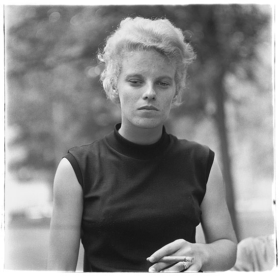 Diane ArbusGirl with a cigar in Washington Square Park, N.Y.C. 1965© The Estate of Diane Arbus