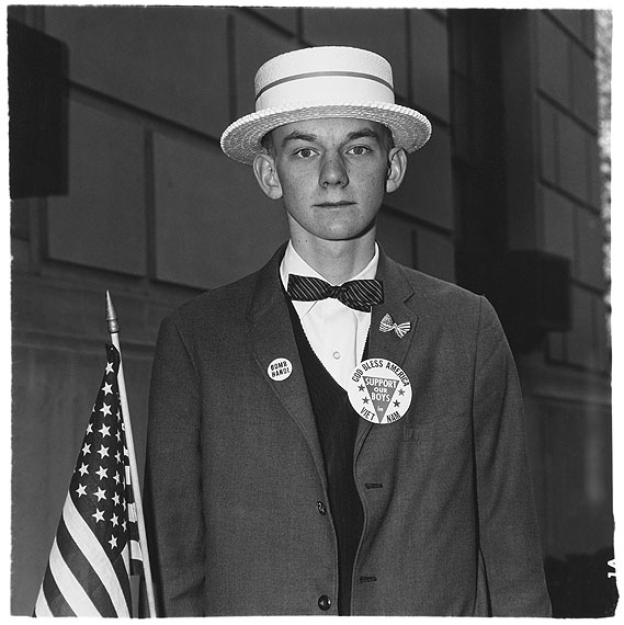 Diane ArbusBoy with a straw hat waiting to march in a pro-war parade, N.Y.C. 1967© The Estate of Diane Arbus