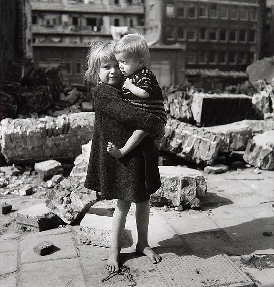 Emmy Andriesse, Children amid the rubble of Rapenburg in the Jewish Quarter. Amsterdam, spring 1945. Coll. JHM