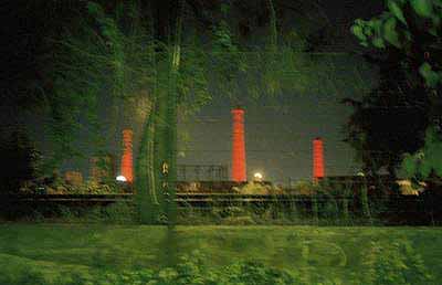 Patrick Zachmann: Friday, June 13, 1 a.m., Gazi, the former gasworks, Athens, Greece, 2003. 56.8x83.9cm © Magnum Photos