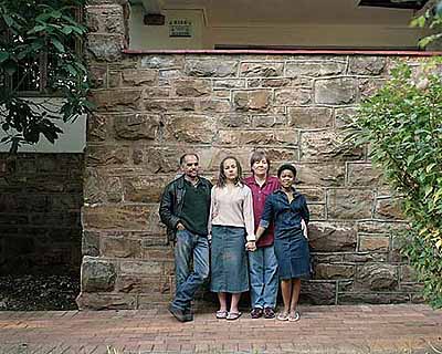 David GoldblattThe Nunn Family, 2002Cedric Nunn, Kathleen 'Kathy' Ebersohn, Liz Ebersohn, Nikiwe MpetsheniColor photograph