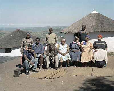 David GoldblattThe Mthethwa Family, 2002MaMagwaza, Nsikayezwe Mthethwa, Mfanawezulu Mthethwa, Qondokuhle Mthethwa, Zizwezonke Mthethwa, MaNthuli, aYengwayo, Nduduzo, MaBiyela, MaNtshangaseColor photograph