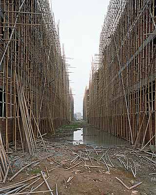 Edward Burtynsky Urban Renewal #1, Factory Construction, Outside Shenzhen,, Guangdong Province, China, 2004 chromogenic print, 58 x 68 inches courtesy of Charles Cowles Gallery, New York