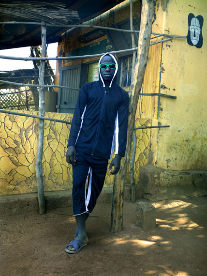 Aboubahkar, outside &lsquo;Galerie d&rsquo;Art Ancien et Moderne,' Tanguieta, Benin, 2011 &copy; Albert Watson