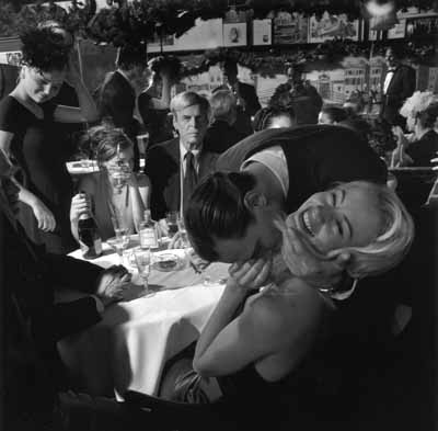 Larry Fink, George Plimpton, Jared Paul Stern, and Cameron Richardson, Elaine's,New York, January 1999. Copyright the artist, courtesy of Stephen Cohen Gallery.