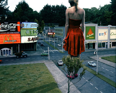 Julia Fullerton-Batten, Red Dress in City, 2005 © Fullerton-Batten