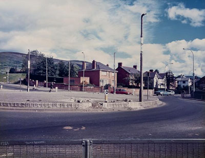 Paul GrahamRoundabout, Andersonstown, Belfast, 1984Vintage chromogenic printEstimate: &pound;1,200-1,500